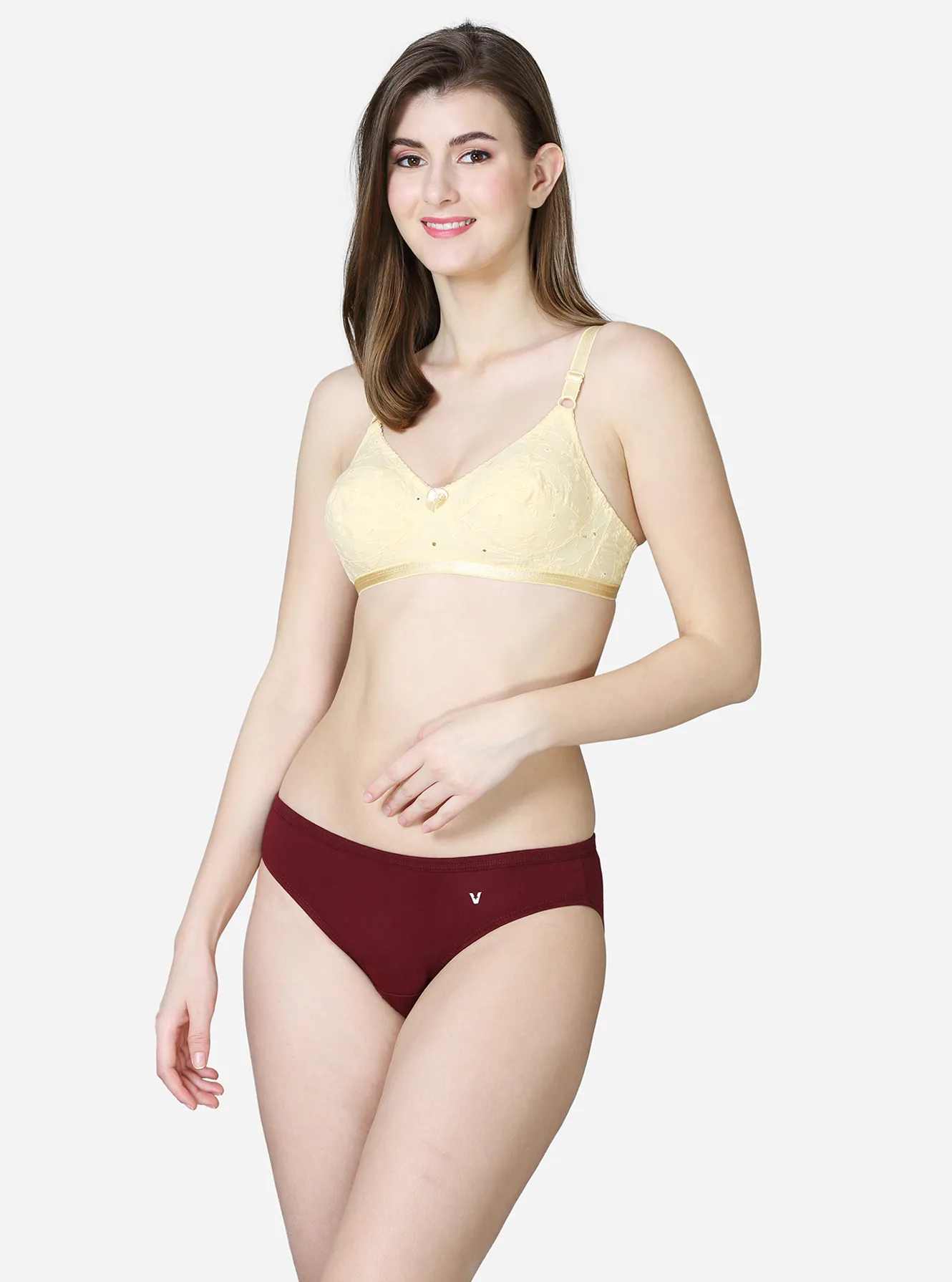 Low rise bikini style panty with concealed elastic waistband